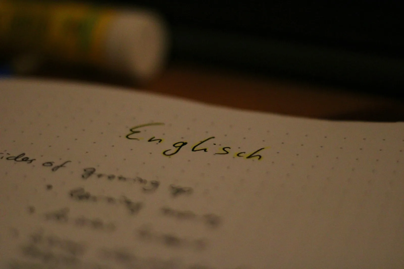 a close up of a book with writing on it
