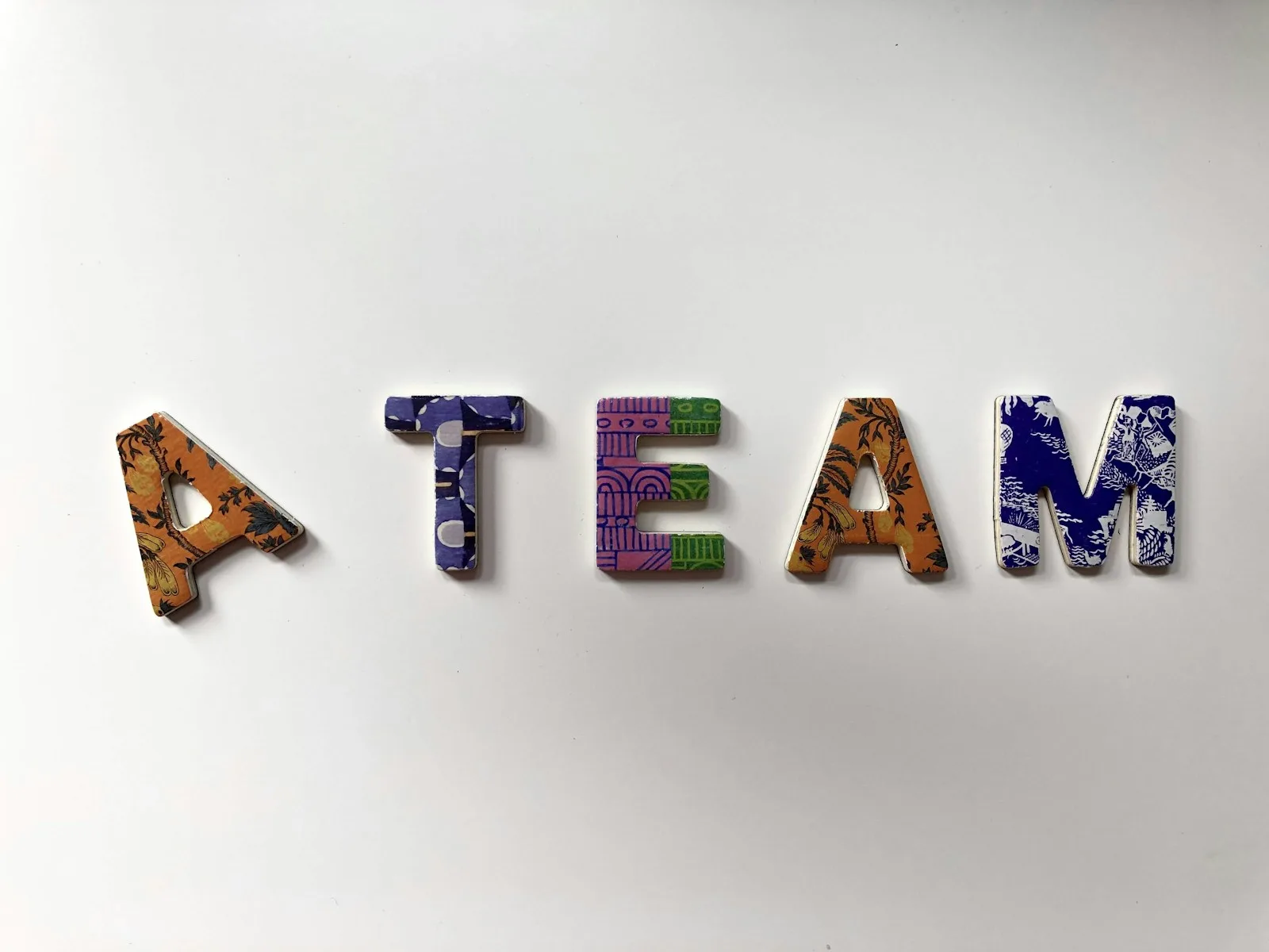 assorted-color A Team text wall decor